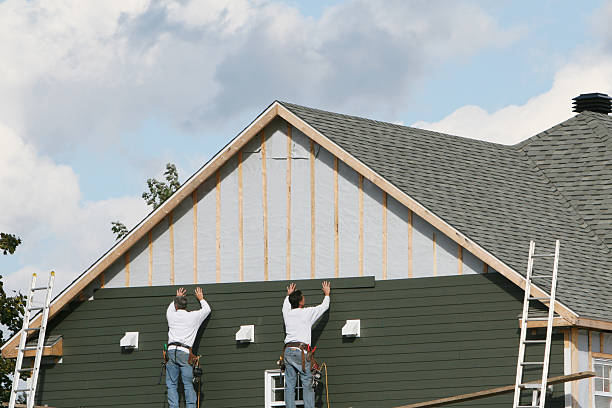 Professional Siding Contractor technician working in Worcester, MA
